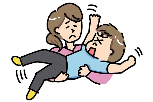 腕の中であばれる子どもを抱える親のイラスト