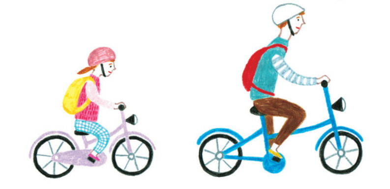 自転車を乗る親子